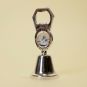 Metal bell and bottle opener with turning image of Pope Francis (on the other side Pope John Paul II).

Price :  6,50 €
